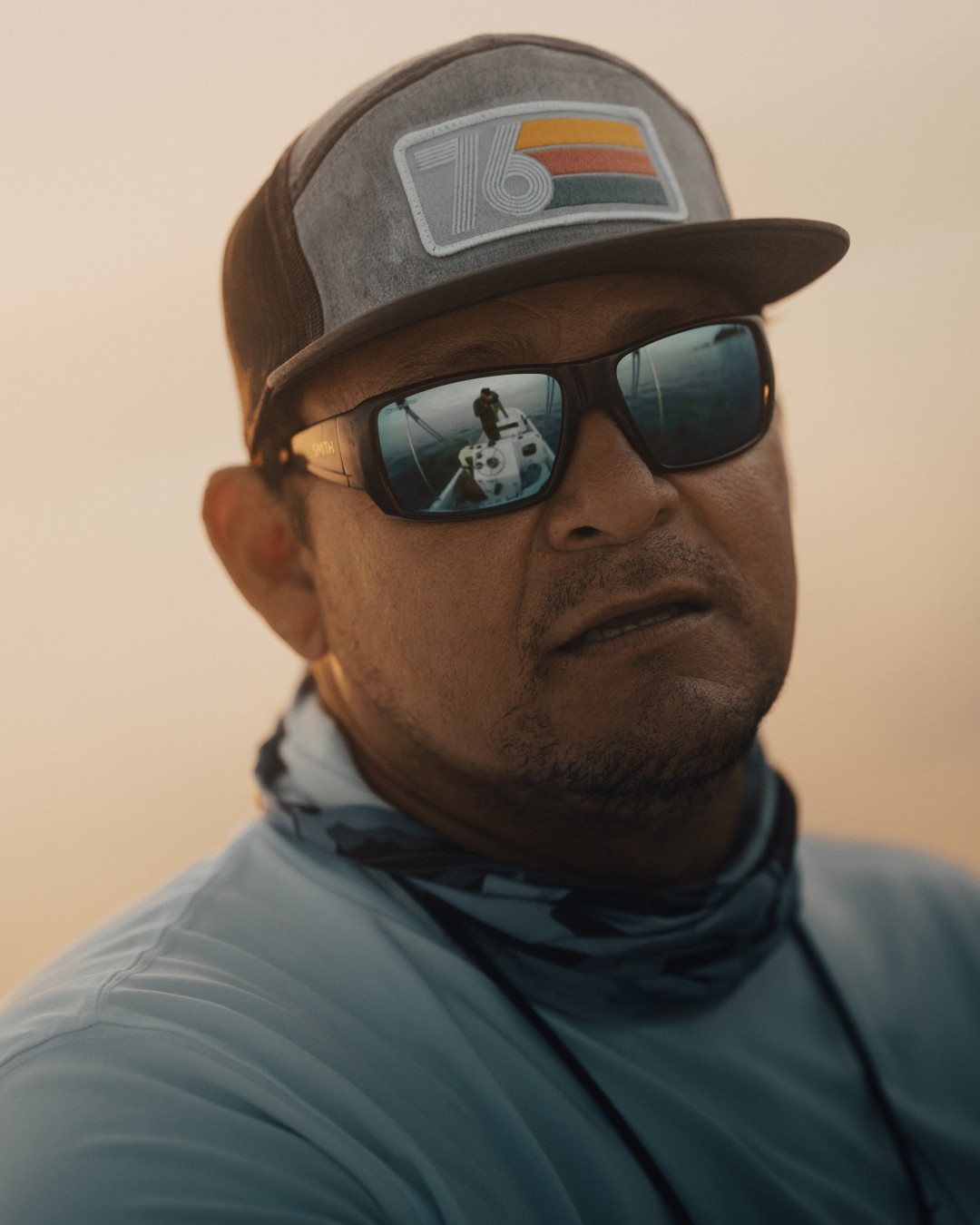 Portrait of Marlon Leslie at sunset, with golden light in the background
